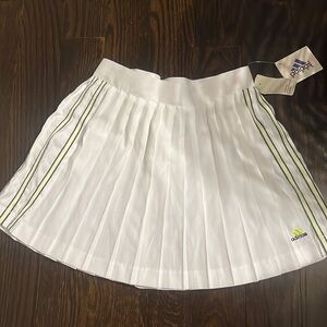 Vintage NWT pleated adidas tennis skirt fluorescent yellowblack trim. Zipper
